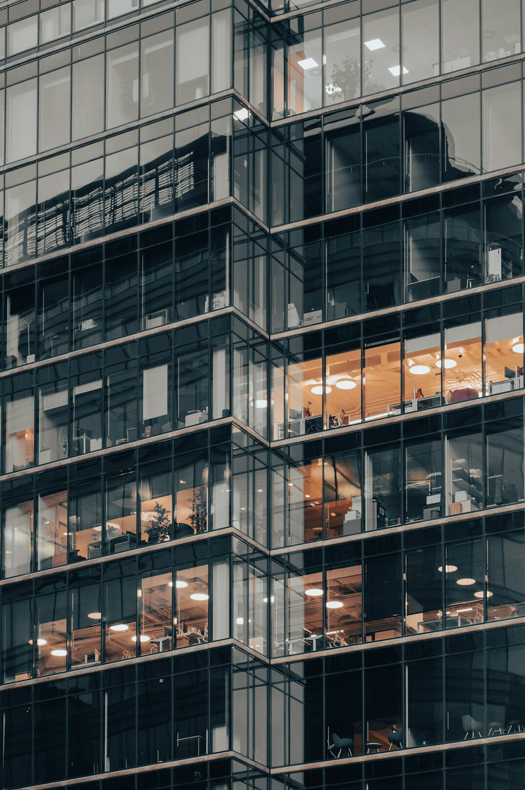 Team of Mexican finance professionals collaborating in a modern office