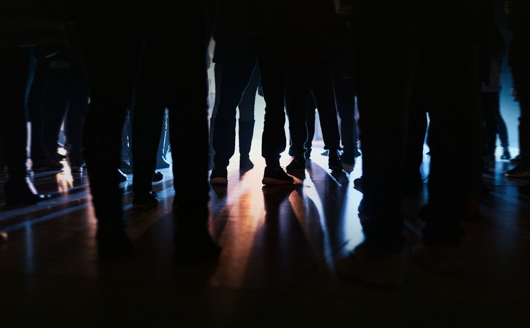 Diverse team of Mexican executives reviewing financial charts in a boardroom